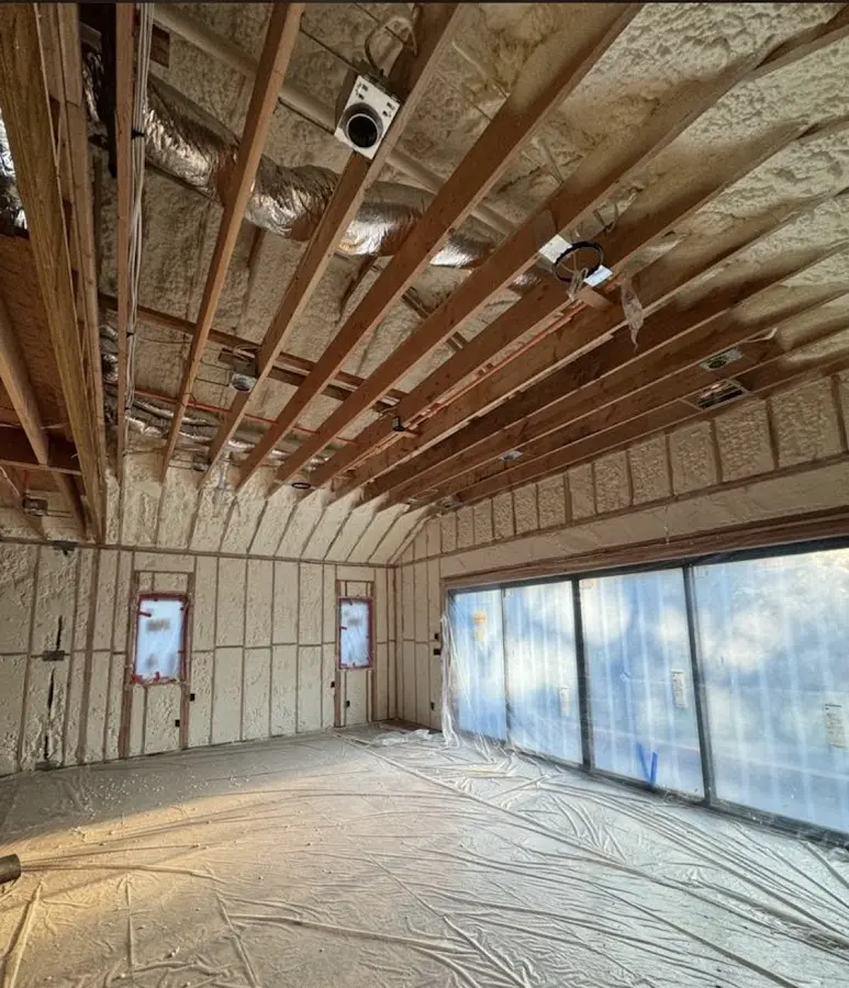 Interior walls and ceiling insulated with spray foam during new construction in Wentzville